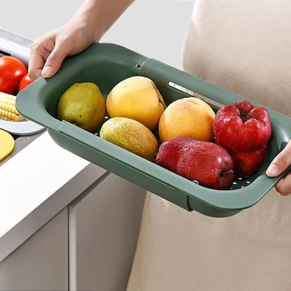 Passoire ergonomique pour laver et égoutter les fruits facilement.
