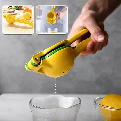 Presse agrume manuel pressant du jus d'orange dans un verre